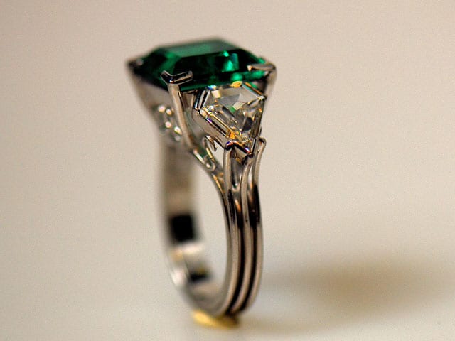 A close up of an emerald ring